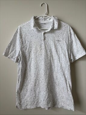Calvin Klein White Polo with Subtle Gray Line Pattern